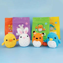 The Woobles Beginner Crochet Amigurumi Kits - finished examples with packaging