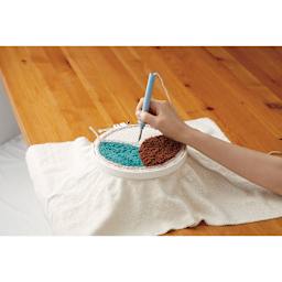 Clover Punch Needle, in hand creating a stitch project