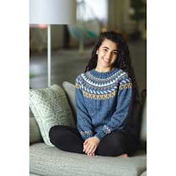 Lion Brand Feels Like Alpaca Yarn, adult wearing sweater made of yarn