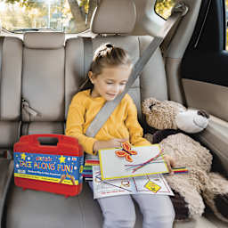 Wikki Stix Take Along Fun Travel Kit - in use by child in backseat of car