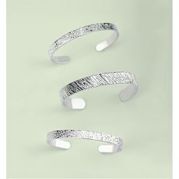 ImpressArt Texture Stamper - Three bracelets shown with various stamped effects
