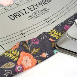 Dritz Ezy-Hem Gauge curved edge in use