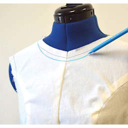 Dritz Mark-B-Gone Marking Pen - Blue, pen in use over fabric