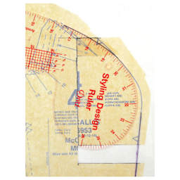 Dritz Styling Design Ruler French curve section on fabric