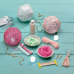 Craftivity Super String Lanterns - Lanterns shown partially assembled with scattered components
