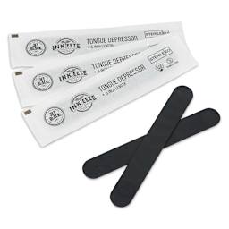 TatSoul Jet Black x Inkeeze Tongue Depressors - Pkg of 100, 3 depressors in packaging and two out of packaging
