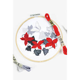 DMC Black Tin Embroidery Floss - Set of 24, Monochrome Colors flower pattern on embroidery hoop (not included)