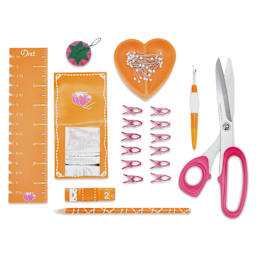 Dritz Sewing Box Kit, Orange and Pink, contents of the packaging laid out. 