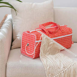 Prym Dachshund Needlework Bag - in use on couch (needles not included)