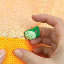 Dritz Soft Comfort Thimble - Large - in use