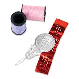 Singer Hand Sewing Thread Kit - Set of 24 showing needles and needle threader with thread spools