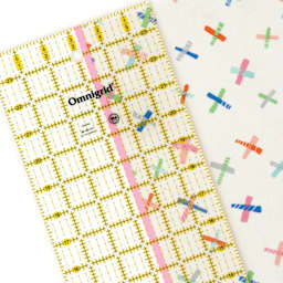 Omnigrid Glow-Line Tape - Set of 3 - in use on rectangle ruler (not included) to measure paper
