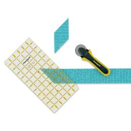 Omnigrid Rectangle Ruler - 6" x 12" - in use with fabric and cutter (not included)