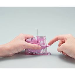Clover Quick Desktop Needle Threader - Dark Pink - preparing to use