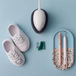 Cricut EasyPress Mini - Zen Blue - in use on table, top view (other materials not included)