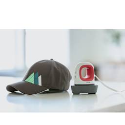 Cricut EasyPress Mini - Raspberry, next to finished design on Hat, not included.