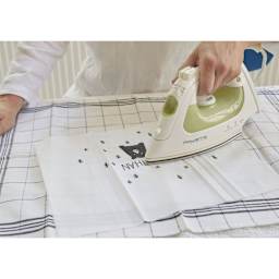 Edding 4600 Textile Pens, iron in hand heat setting a design on fabric