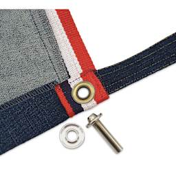 Dritz Grommet Tools, setter and anvil next to fabric with finished grommet (not included)