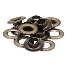 Dritz Grommets - Antique Brass, Pkg of 8, laid outside of the packaging
