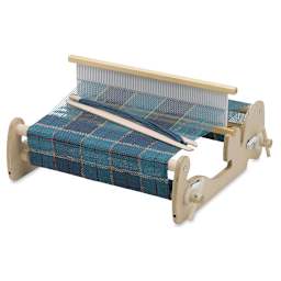 Schacht Cricket Loom - Right angled view of 15" wide loom showing woven fabric