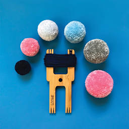 Loome Fiber Craft Tools - Robot Tool shown with various size pom poms possible