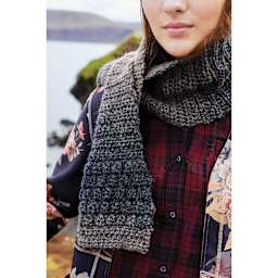 Lion Brand Scarfie Yarn, adult wearing scarf made of yarn