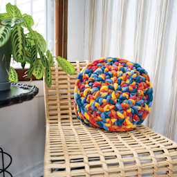 Lion Brand Cover Story Thick & Quick Yarn finished pillow example