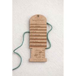 Twig & Horn Wraps Per Inch Tool with yarn thread