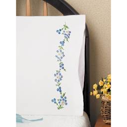 Design Works Stamped For Embroidery Pillowcase - Blue Daisies, sample of finished embroidery