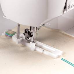 Singer Stylist 7258 Sewing Machine, close up of the button hole foot