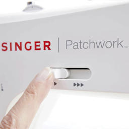 Singer C5980Q Patchwork Plus Sewing and Quilting Machine close up to show speed gauge