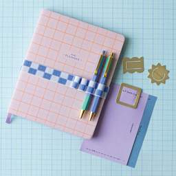 Kikkerland Inkerie Pen Holder Book Band - Blue, on notebook