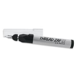 Beadsmith Thread Zap II - Angled view of uncapped Tool with Cap adjacent
