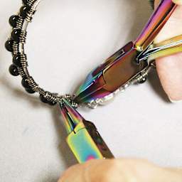 Beadsmith Chroma Round Nose Pliers - Closeup of Pliers modifying jewelry