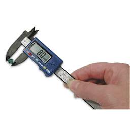 Beadsmith Digital Caliper - Hand holding Caliper measuring bead