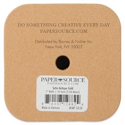 Paper Source Satin Ribbon - Antique Gold, 1" x 10 yds, back of package