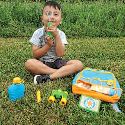 Melissa & Doug Let's Explore Hiking Play Set (Child in grass with backpack)