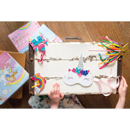 JackInTheBox 6-in-1 Activity Box Kit - All Things Magical (child setting out the finished crafts)