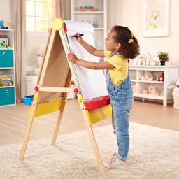 Melissa & Doug Easel Paper Pad - 17" x 20", Top-Bound, 50 Sheets (Model using paper pad on easel)