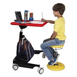 Child sitting at a Kore Design Kids Sit-Stand Mobile Student Desk.