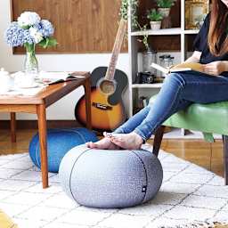 Time Concept Jelly Pouffe Chair - Gray (Model using Jelly Pouffe as footrest)