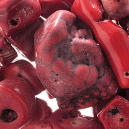 John Bead Earth's Jewels - Closeup of assorted Red Bamboo Coral Beads
