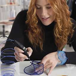 3Doodler Pro 3D Printing Pen Set - in use to create bracelet