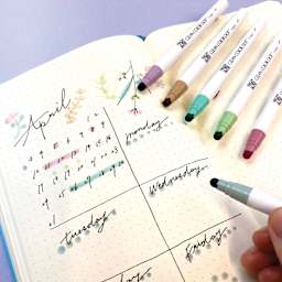 Zig Clean Color Dot Markers, in hand drawing on paper