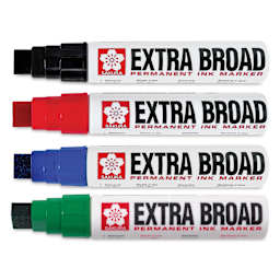 Sakura Extra Broad Permanent Ink Markers, laid out with caps off