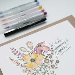 Speedball Hand Lettering Brush Markers - finished lettering example next to flower illustration