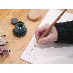 Kakimori Sakura Wood Nib Holder, in hand and in use