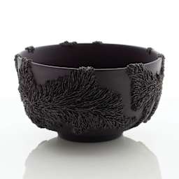 Sio-2 Black Ice Porcelain Clay, black bowl with raised floral detail by Olivia Walker