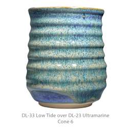 DL-33 Low Tide over DL-23 Ultramarine. Cone 6.