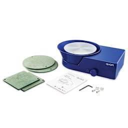 Quark S+ Potter’s Wheel - Blue with four bats, an allen key, two bat pins, and a user manual